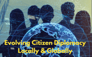 Evolving Citizen Diplomacy Locally & Globally - globe in front of 5 human silhouettes