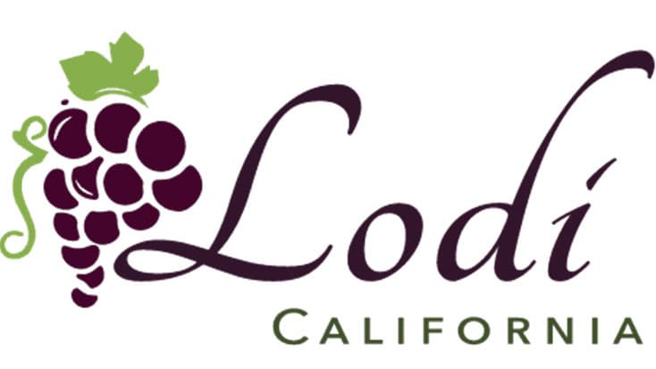 The logo for Lodi, California featuring purple grape cluster with green leaves and grape vine