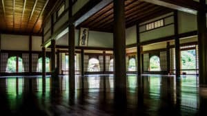 The interior of Shizutani School auditorium near Bizen Japan with shiny wooden floors.