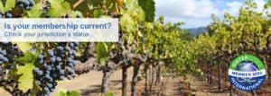 Photo of California vineyards with text overlay that reads "Is your membership current? Check your jurisdiction's status"