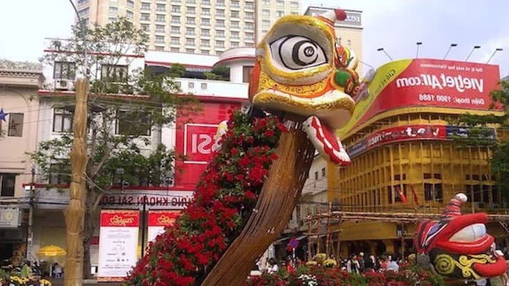 A dragon float celebrates Tet, the Lunar New Year, on a street in Vietnam.